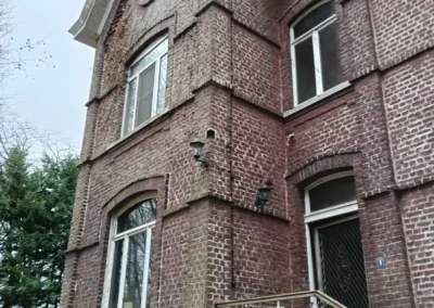 Detail van karakteristiek metselwerk bij historische woning in Sas van Gent
